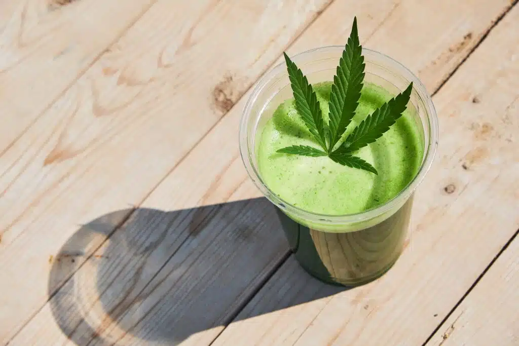 Cannabis smoothie on wooden